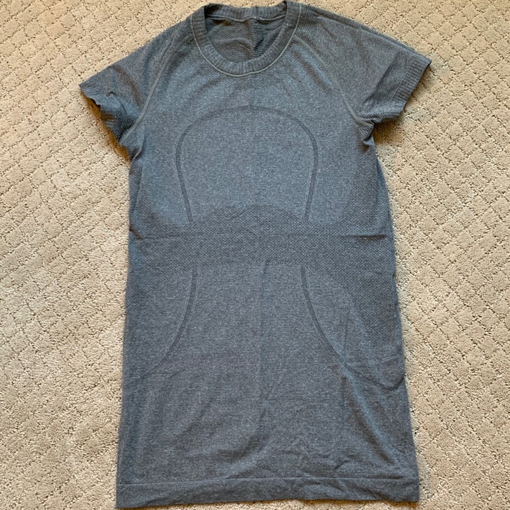 Lululemon shirt. Size XS. Grey short sleeve. Gently used. Tag cut out.